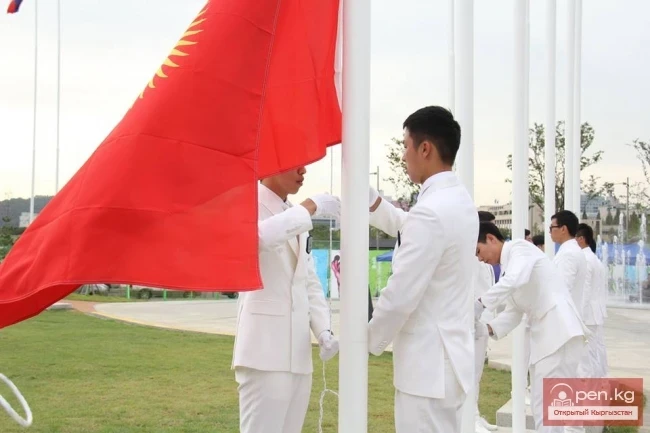 The flag of Kyrgyzstan raised in the Olympic Village of the Asian Games