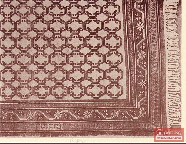 Part of a Kara-Kyrgyz carpet with a buckle pattern from the Fergana region.