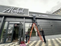 In Osh, signs not in the Kyrgyz language are being dismantled en masse.