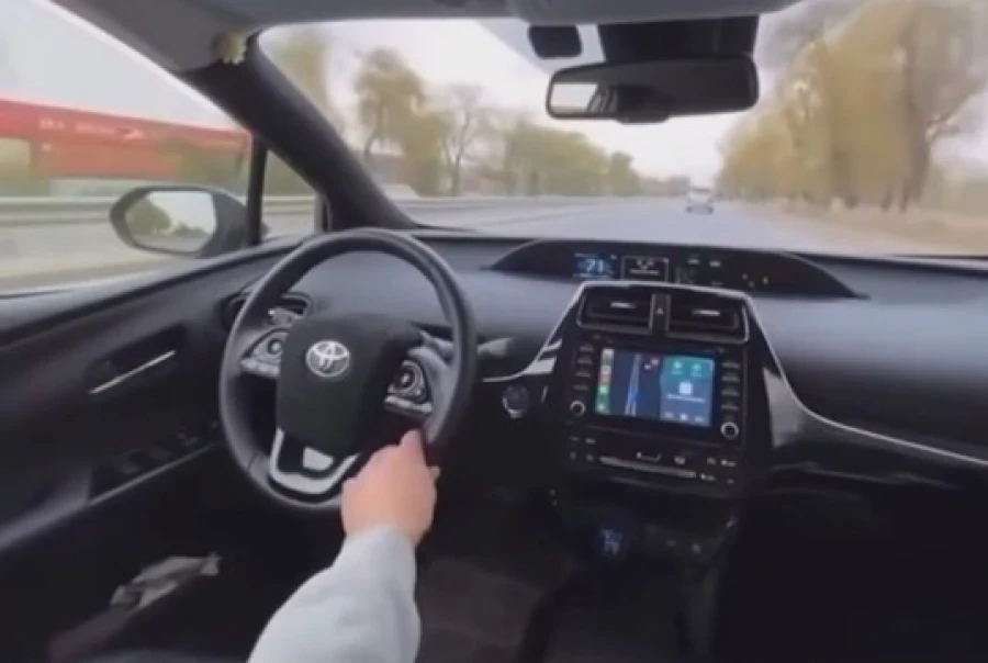 Patrol officers found a driver who was operating a car from the back seat.