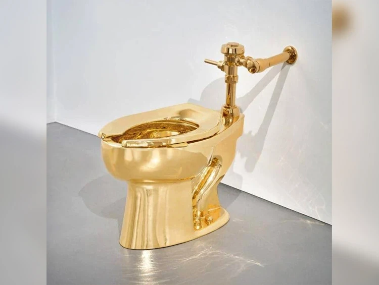 Golden Toilet "America" Sold at Auction for $12.1 Million