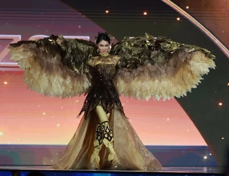 Meri Kuakova represented Kyrgyzstan at Miss Universe in the image of a golden eagle