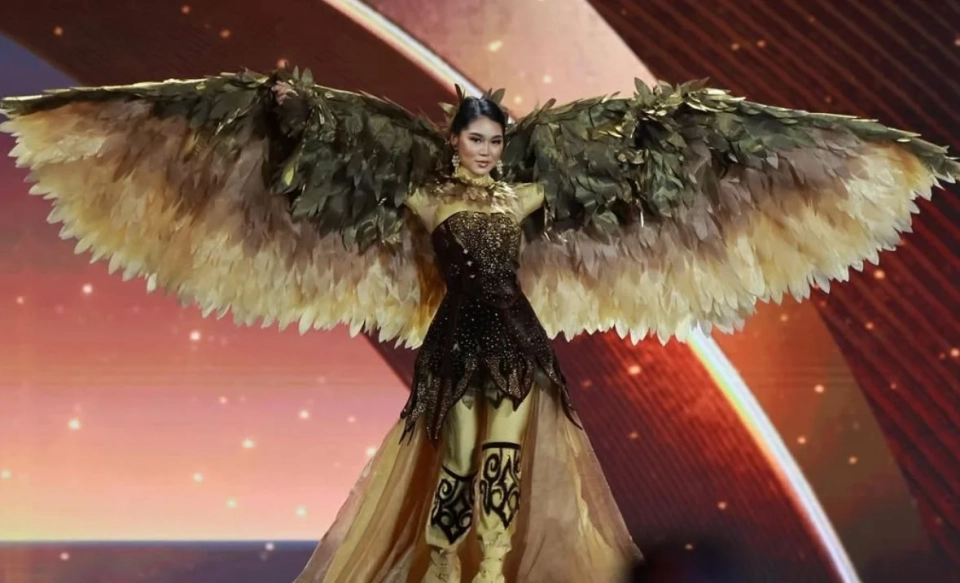 Meri Kuvatova represented Kyrgyzstan at Miss Universe in the image of a golden eagle