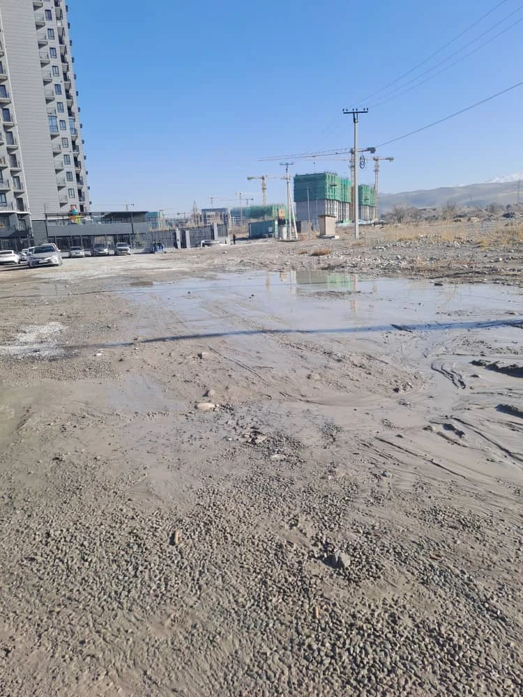 Residents of the apartment building on Aitmatov Avenue request road repairs near their home. Response from the city hall