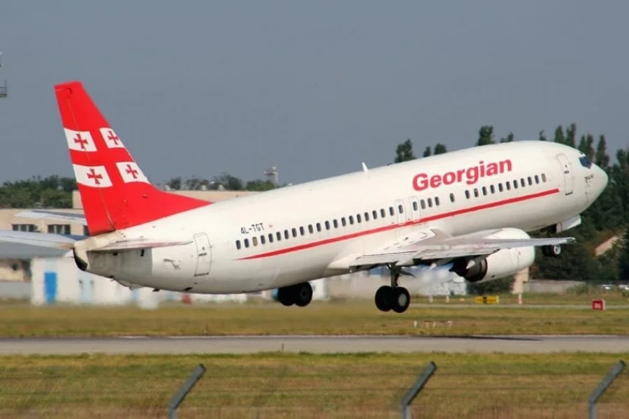 Georgia plans a flight from Beijing to Tbilisi with a stopover in Bishkek