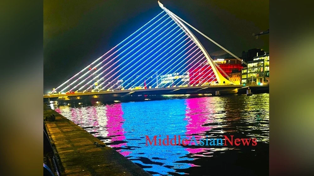 The Samuel Beckett Bridge Illuminated with the Colors of the Mongolian National Flag. Photo