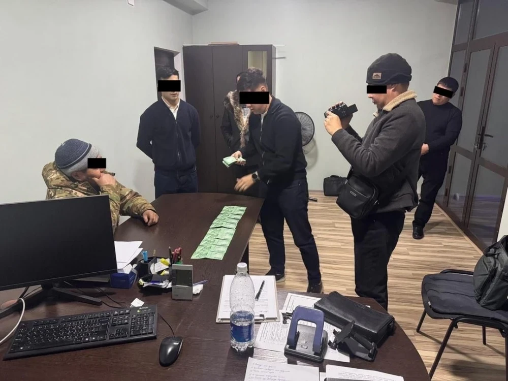 Official attempted to bribe the GKNB for the illegal distribution of 56 plots