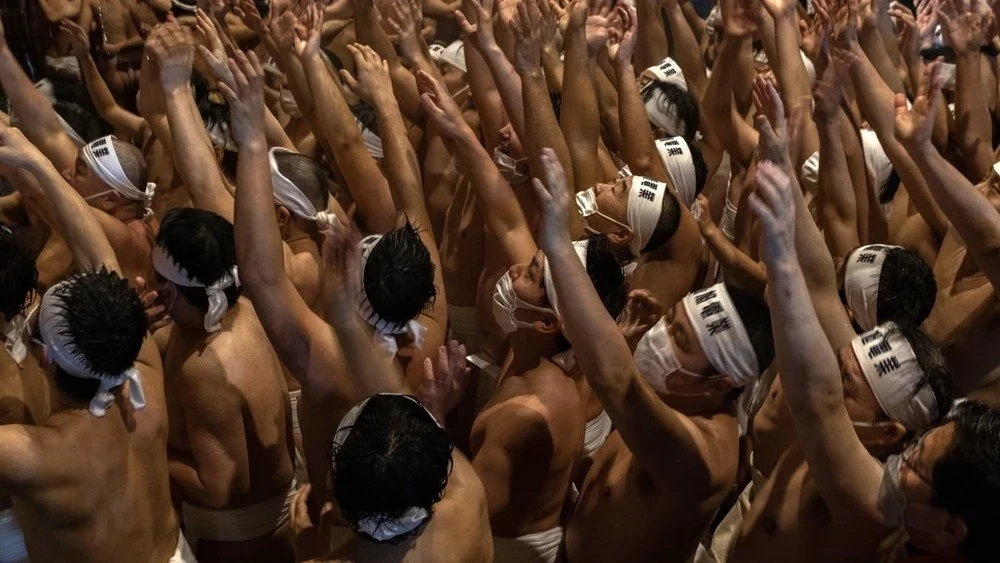 In Japan, a stampede occurred during the "Naked Festival," injuring six people