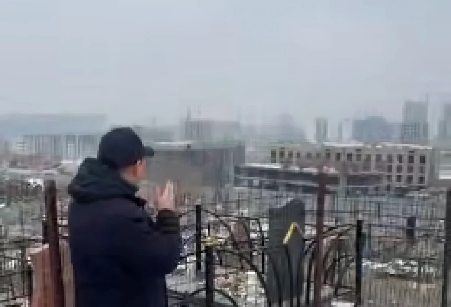 An elite residential complex is being built next to a cemetery in the village of Orto-Sai